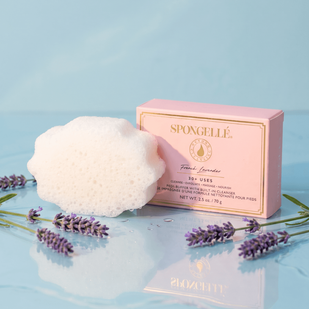 a sponge and lavender flowers next to a box