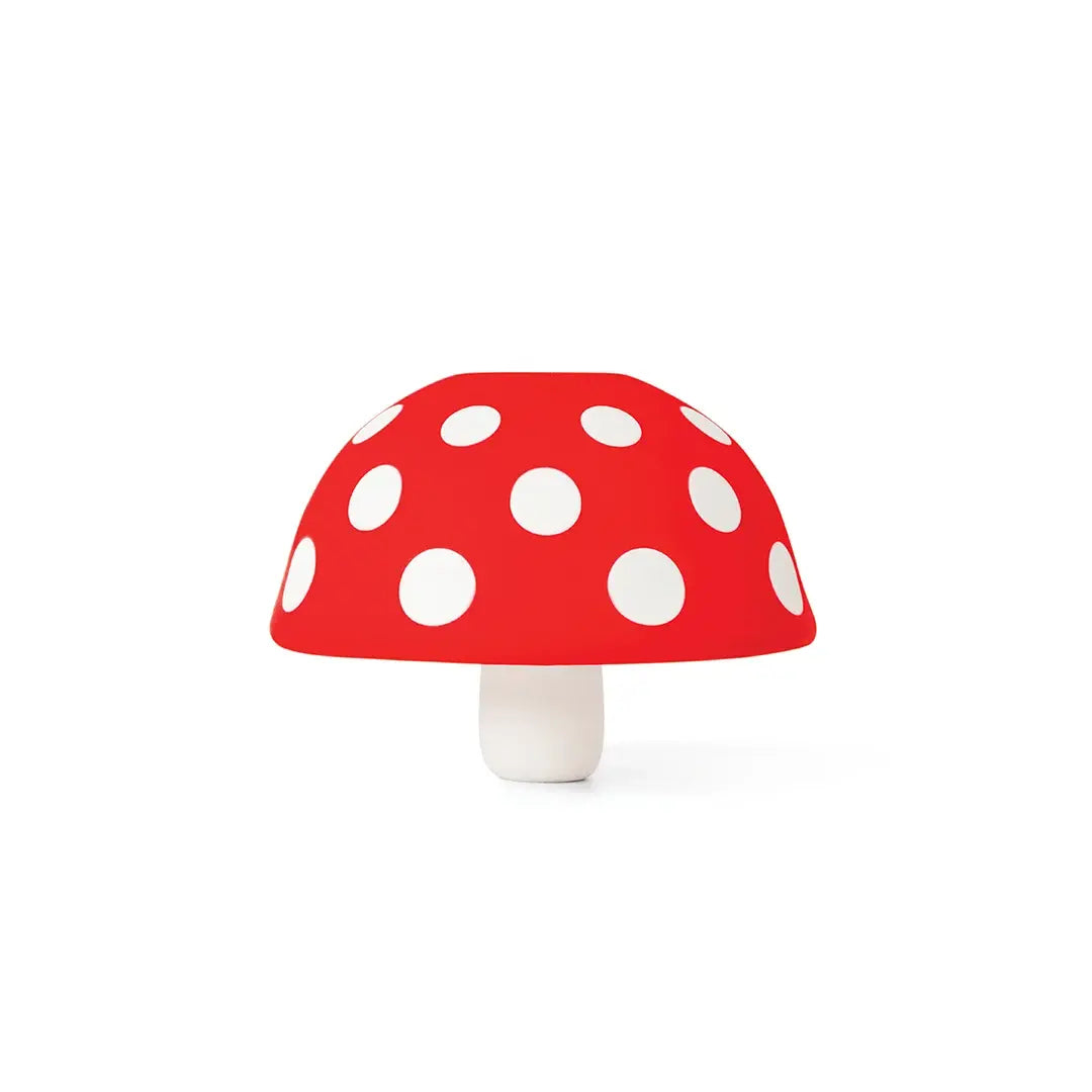 a red and white mushroom with white dots