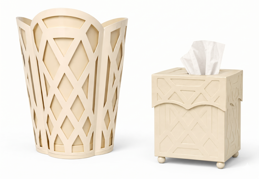 a white trash can and a tissue box