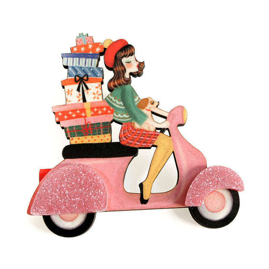 a pink scooter with a girl riding a pink scooter