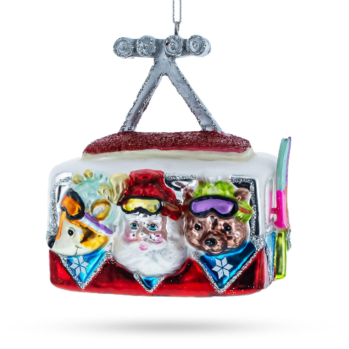 a christmas ornament with a picture of santa claus and reindeer