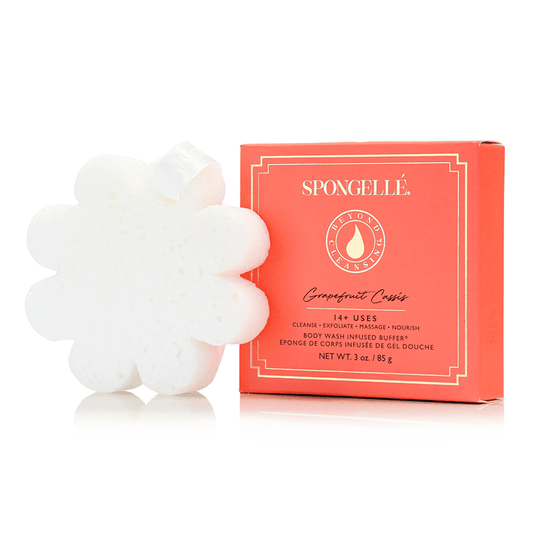 a white sponge next to a box