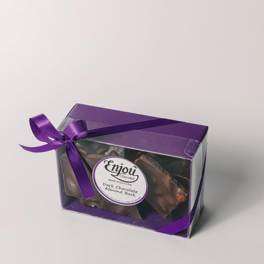 a purple box with a purple bow