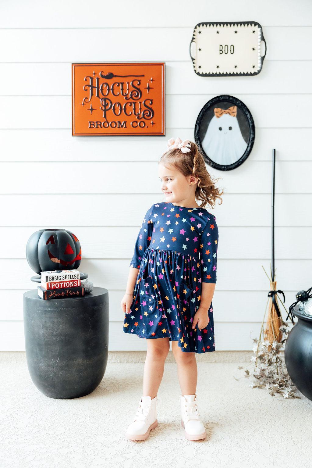 a girl in a blue dress
