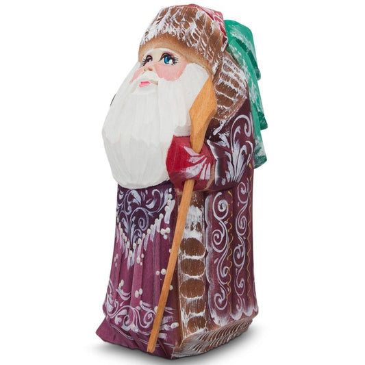a wooden figurine of a santa claus