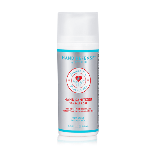 a white and blue bottle of hand sanitizer