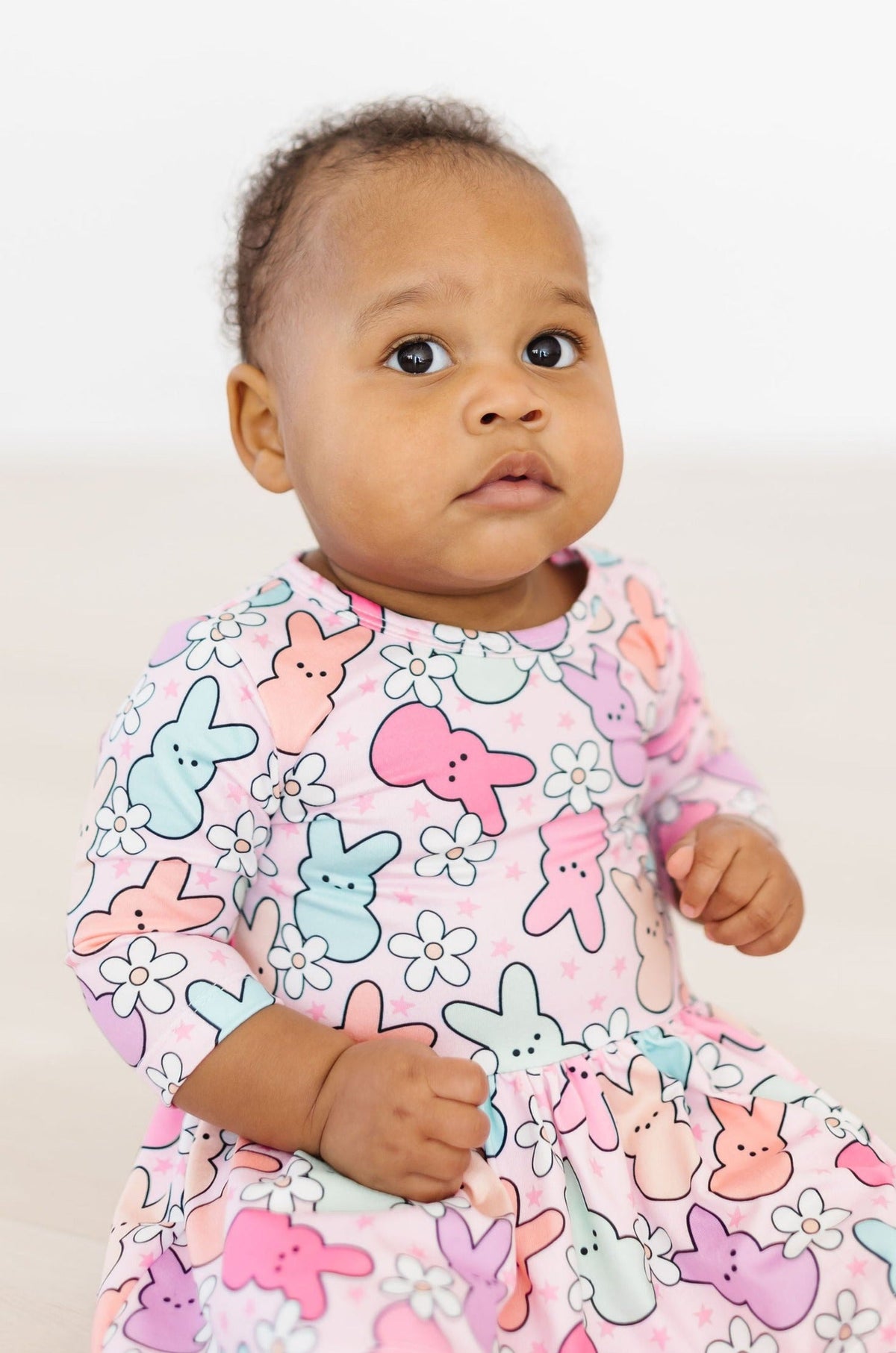 a baby in a dress