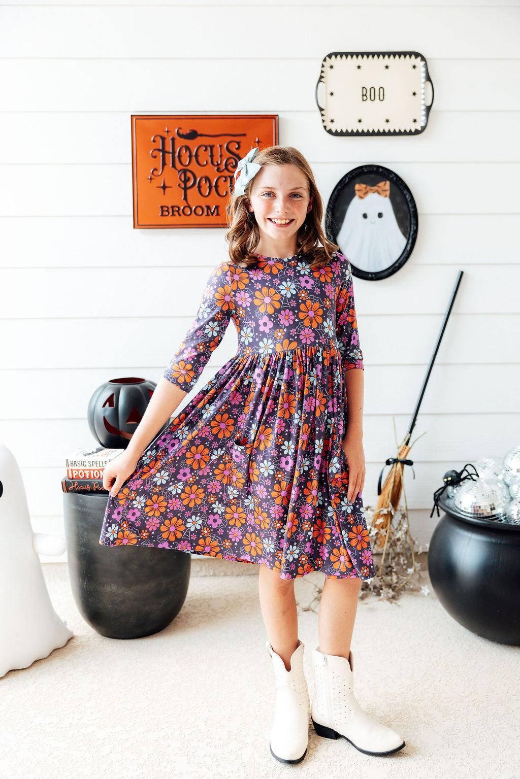 a girl in a dress