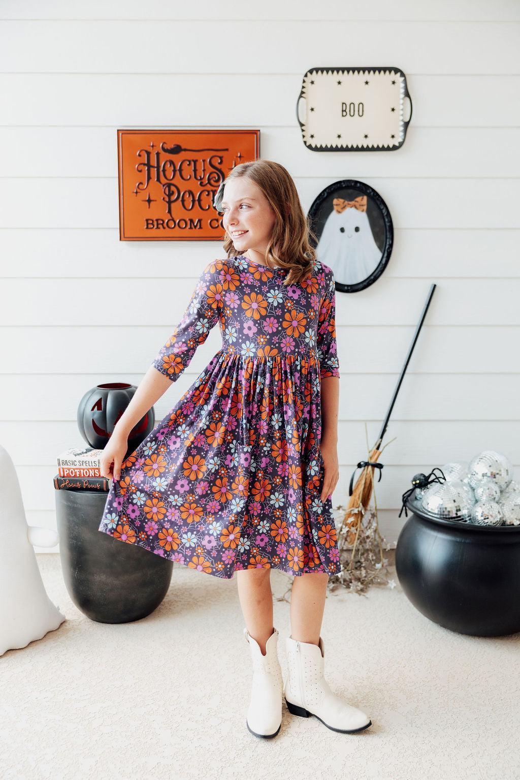 a girl in a dress