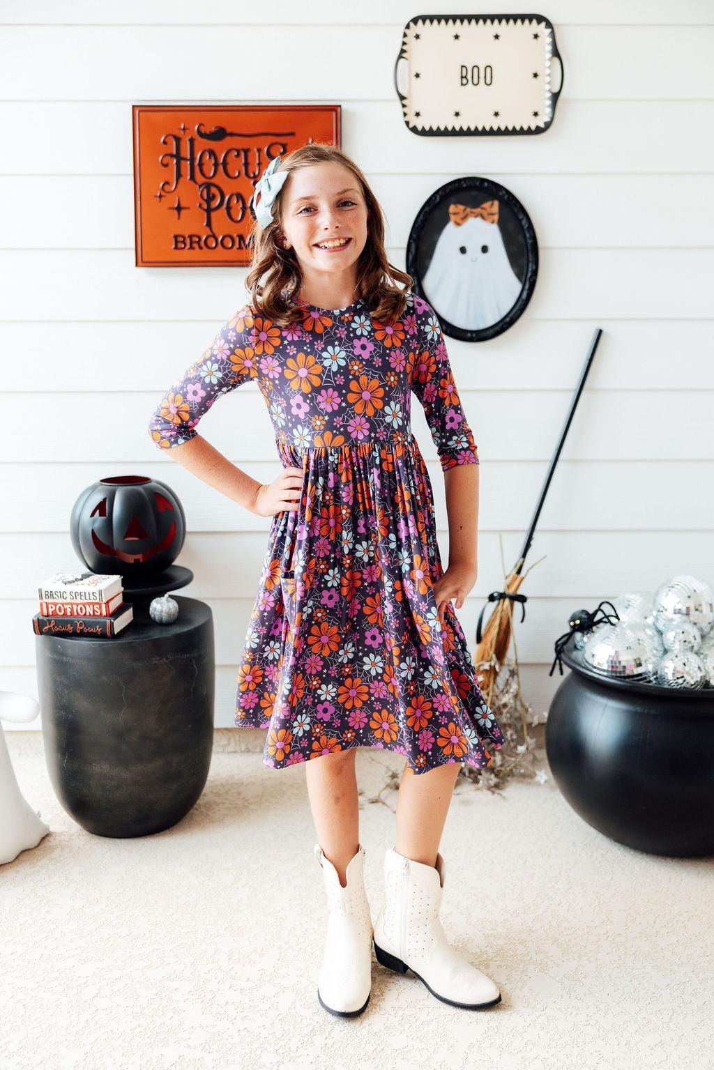 a girl in a dress