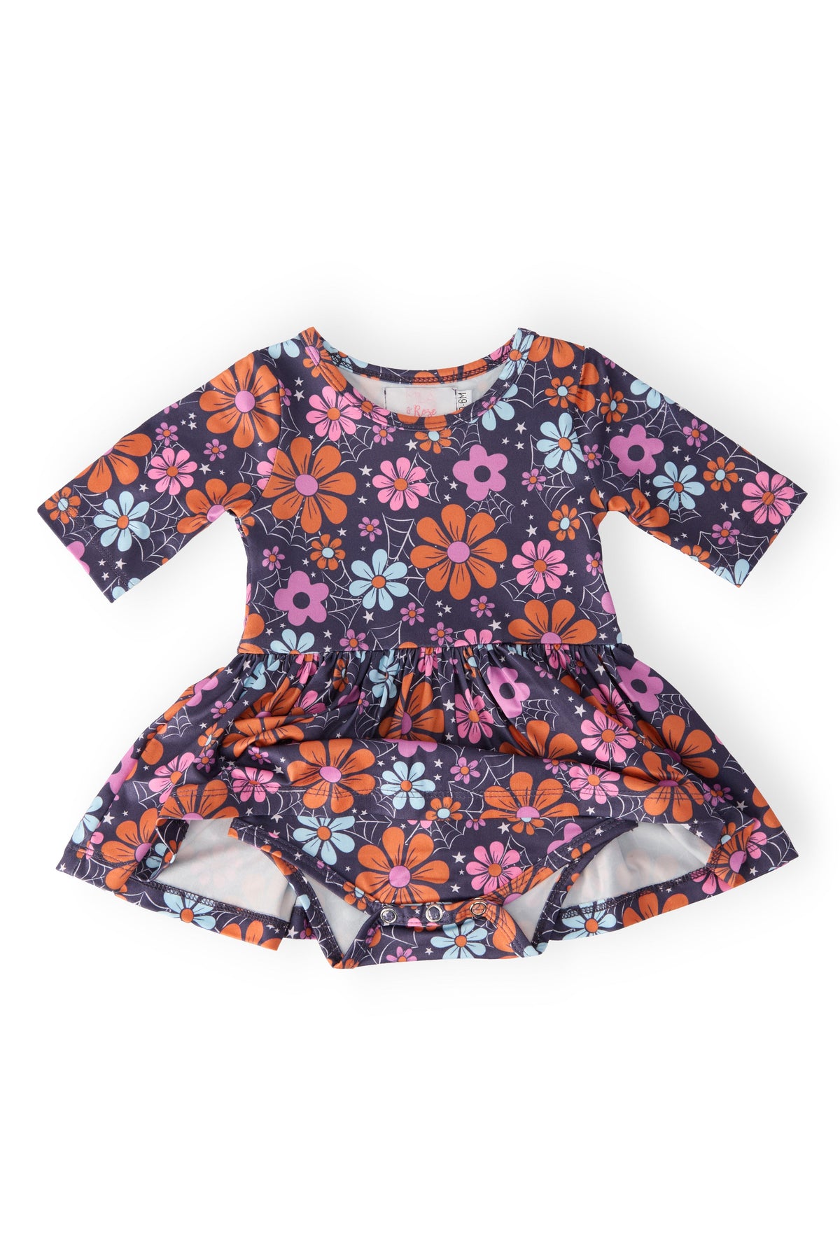 a baby dress with flowers on it