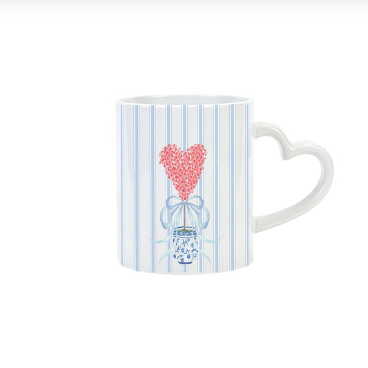 a mug with a heart design