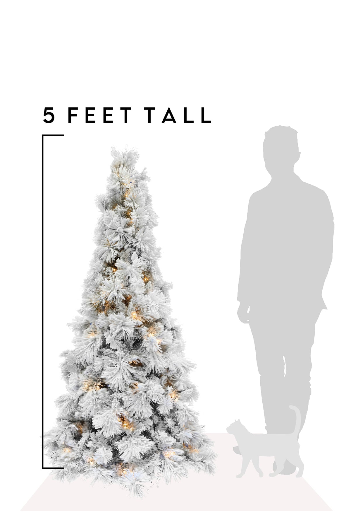 a white christmas tree with lights and a person standing next to it
