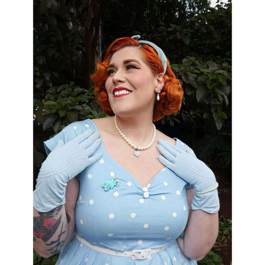 a woman in a blue dress