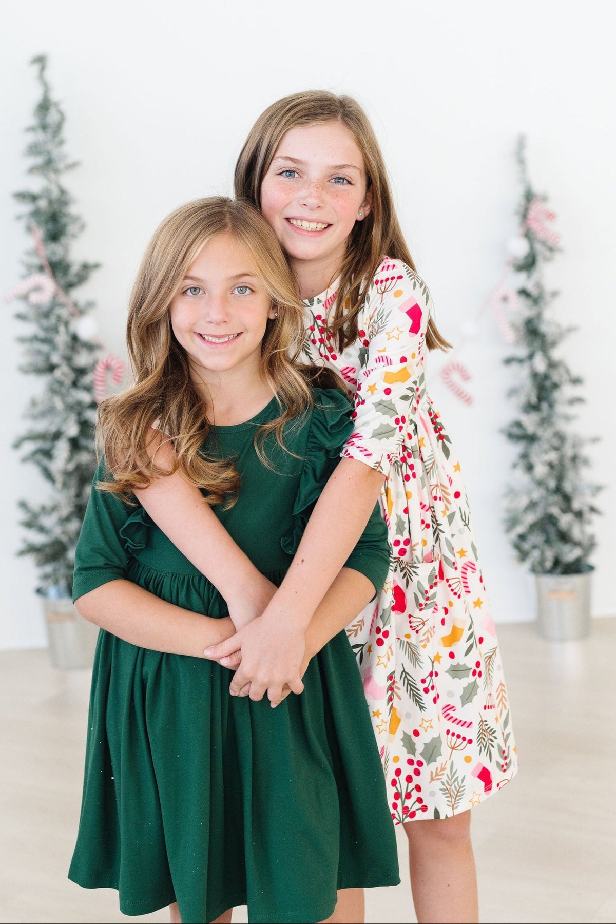 two girls posing for a picture