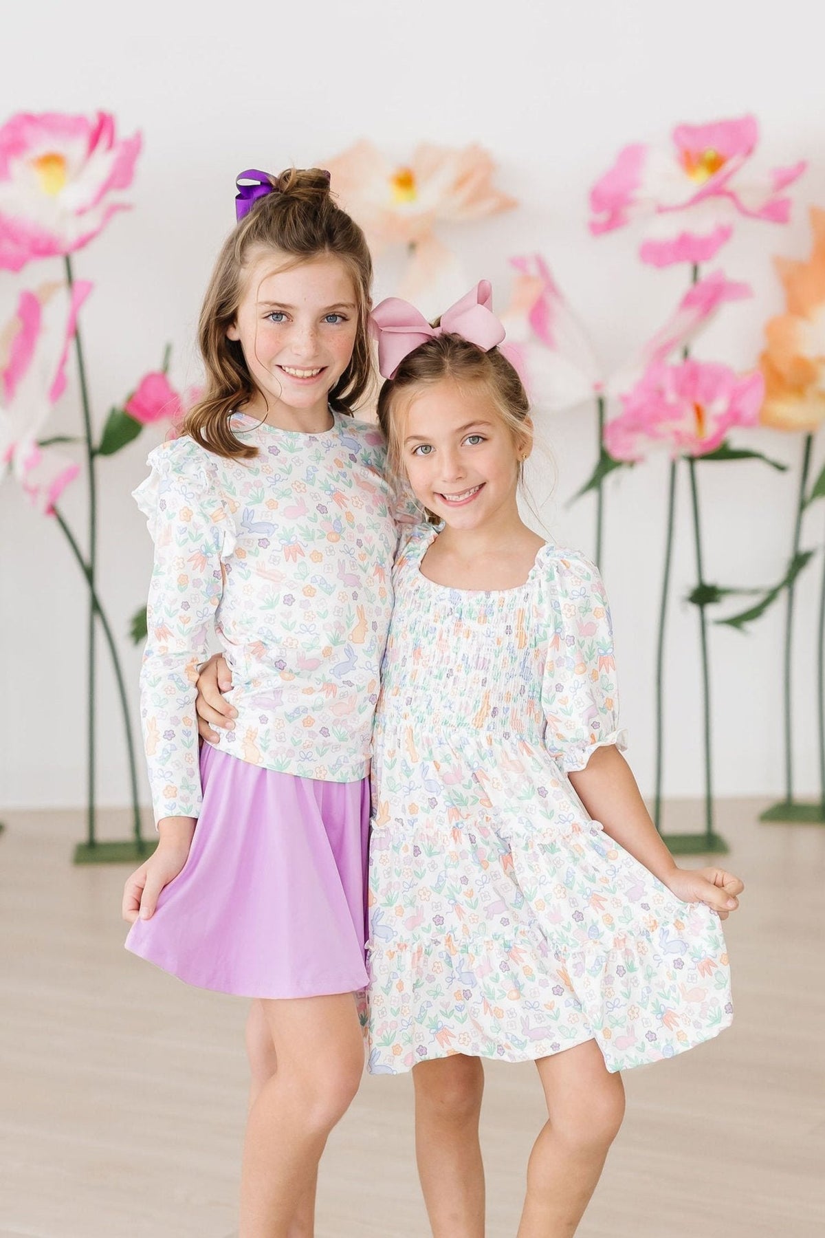 two girls posing for a picture