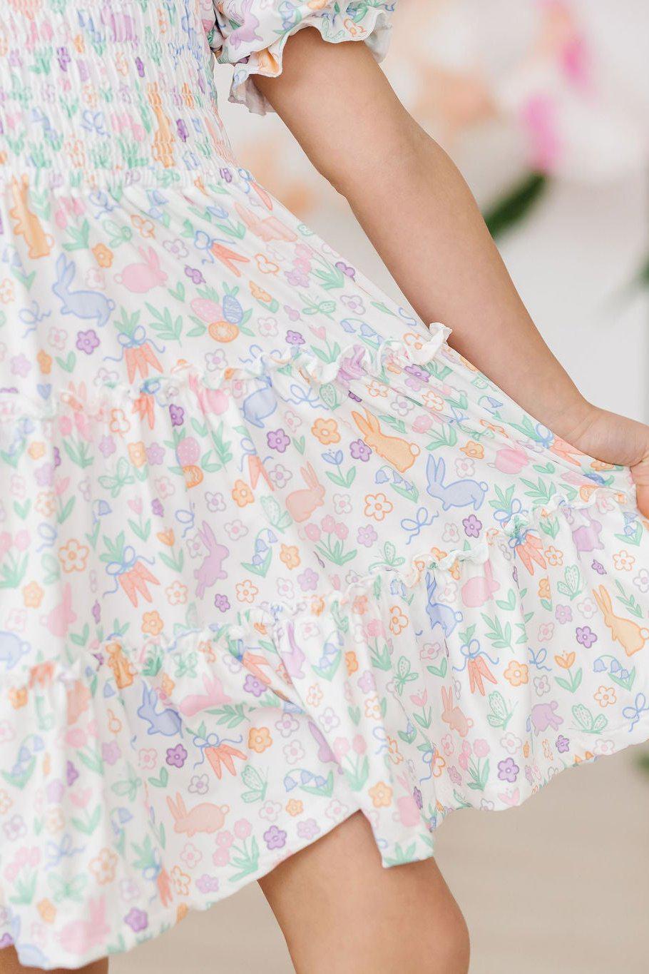 a person holding a dress