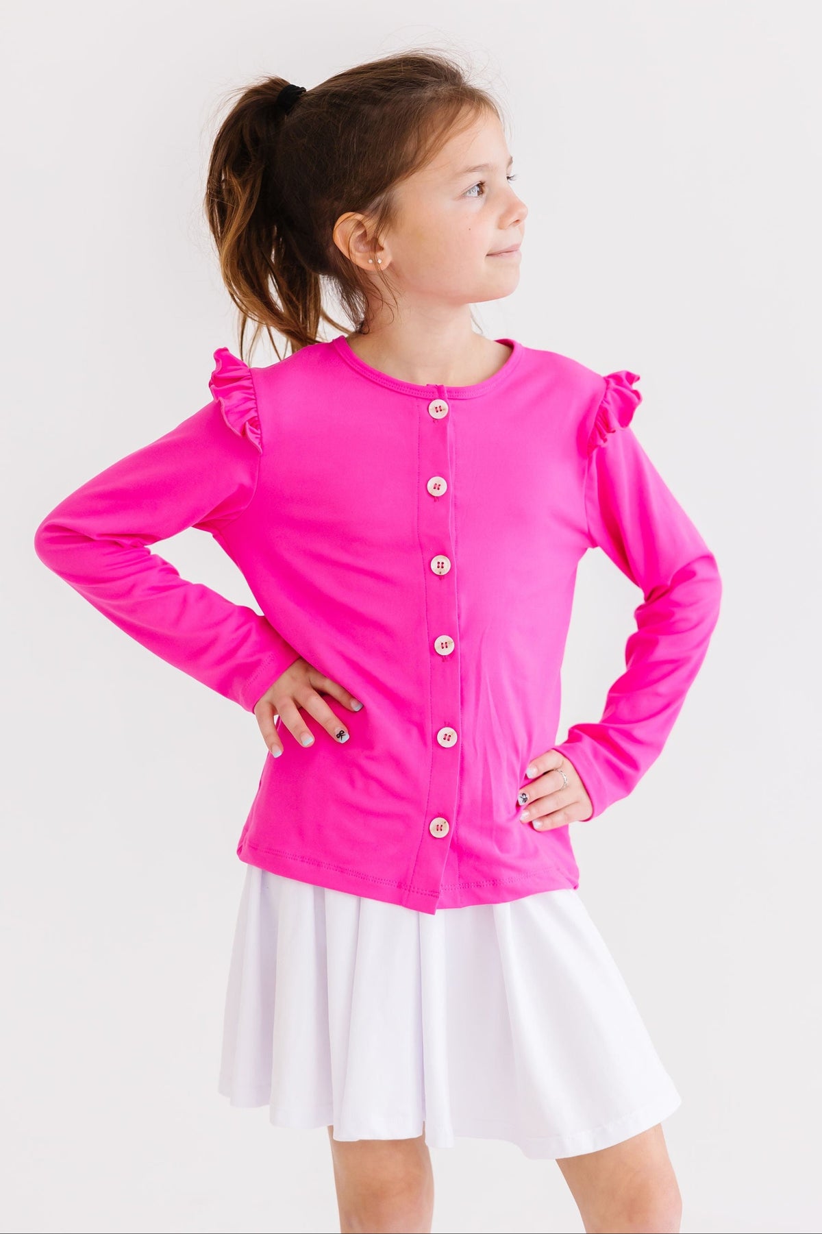 a girl in a pink shirt