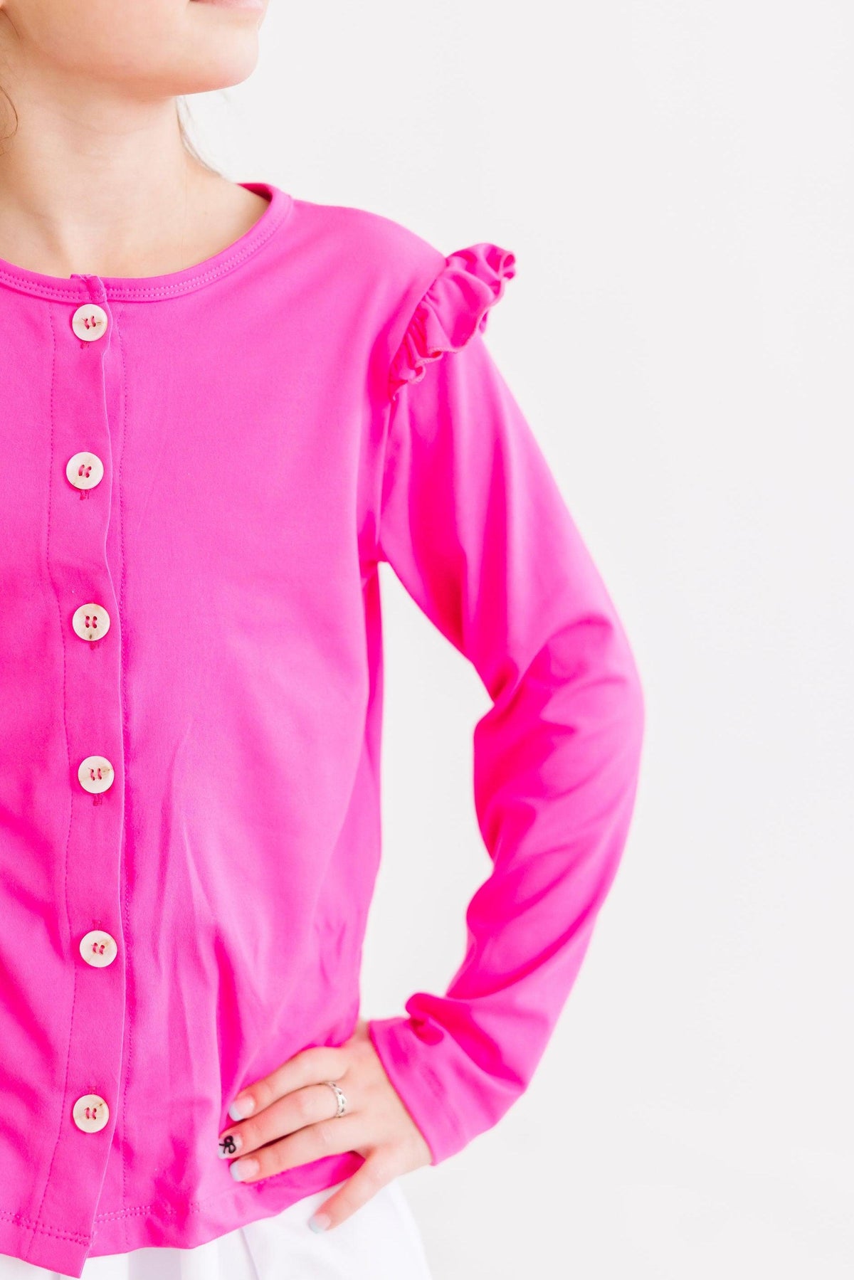 a close up of a girl's shirt