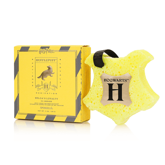 a yellow sponge with a black ribbon next to a yellow box
