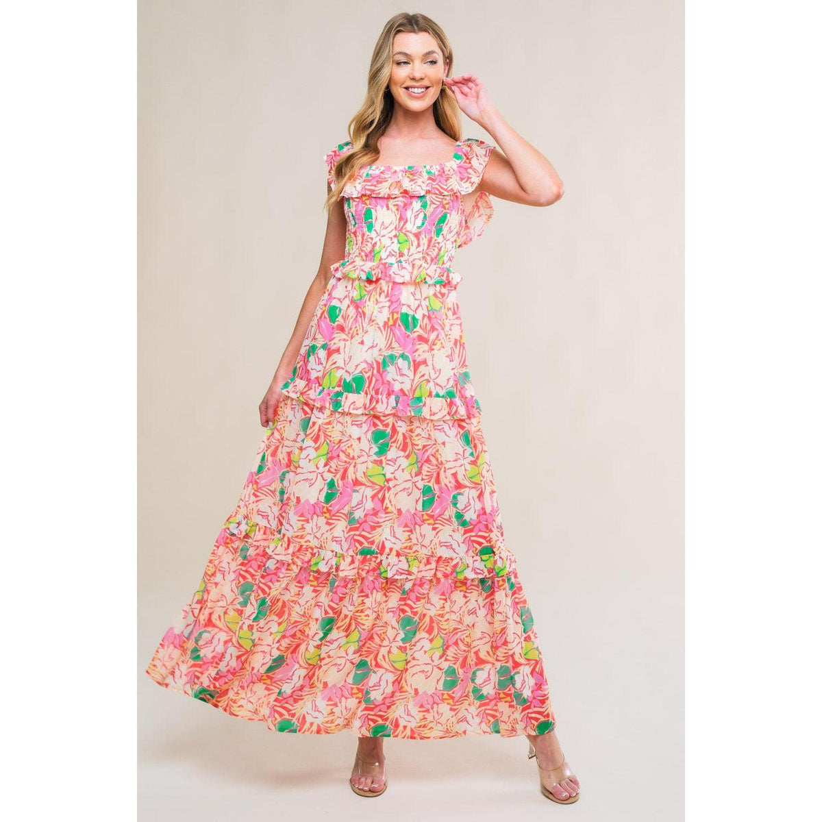 a woman in a floral dress