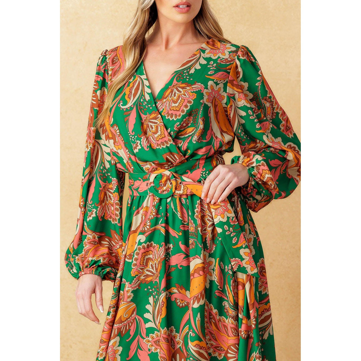 a woman in a green dress