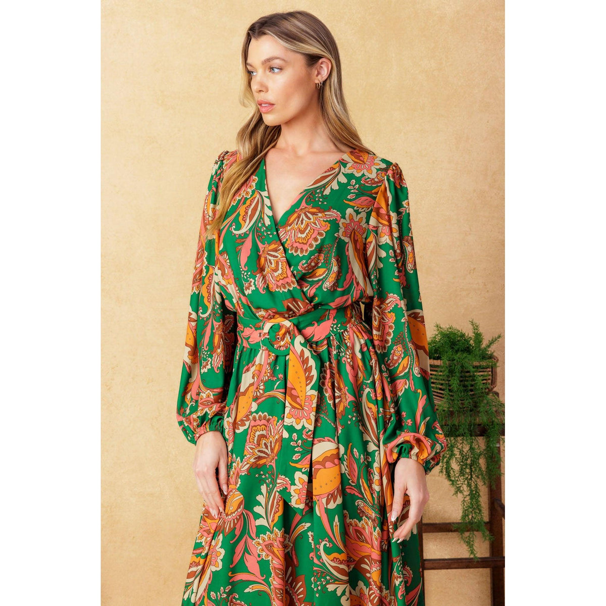 a woman in a green dress