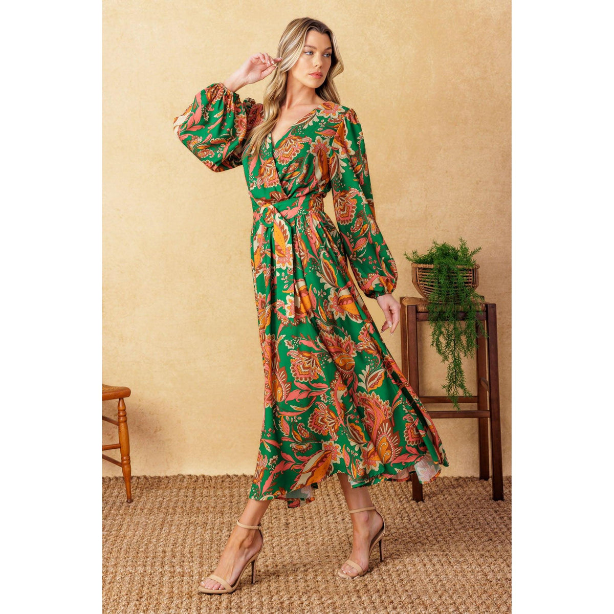 a woman in a green dress