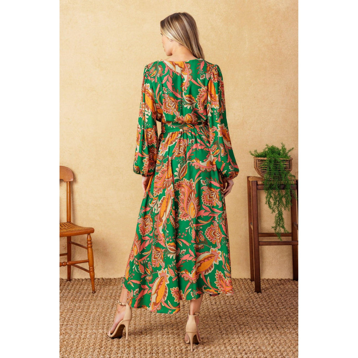 a woman in a green dress