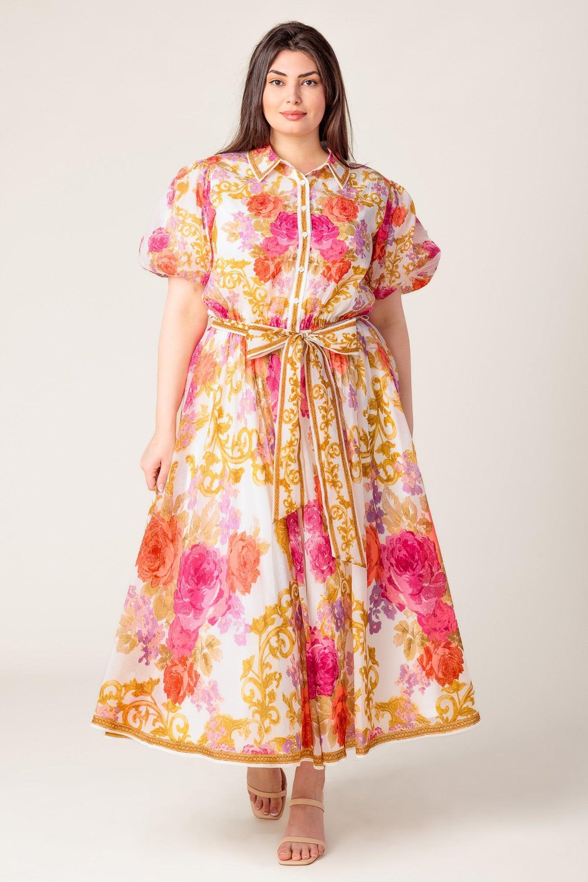 a woman in a floral dress