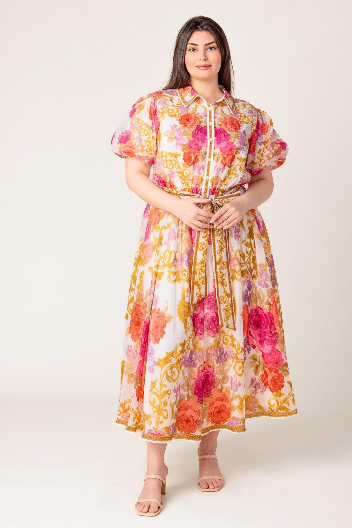 a woman in a floral dress