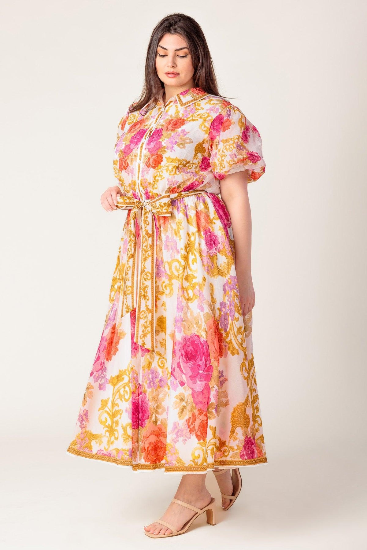 a woman in a floral dress