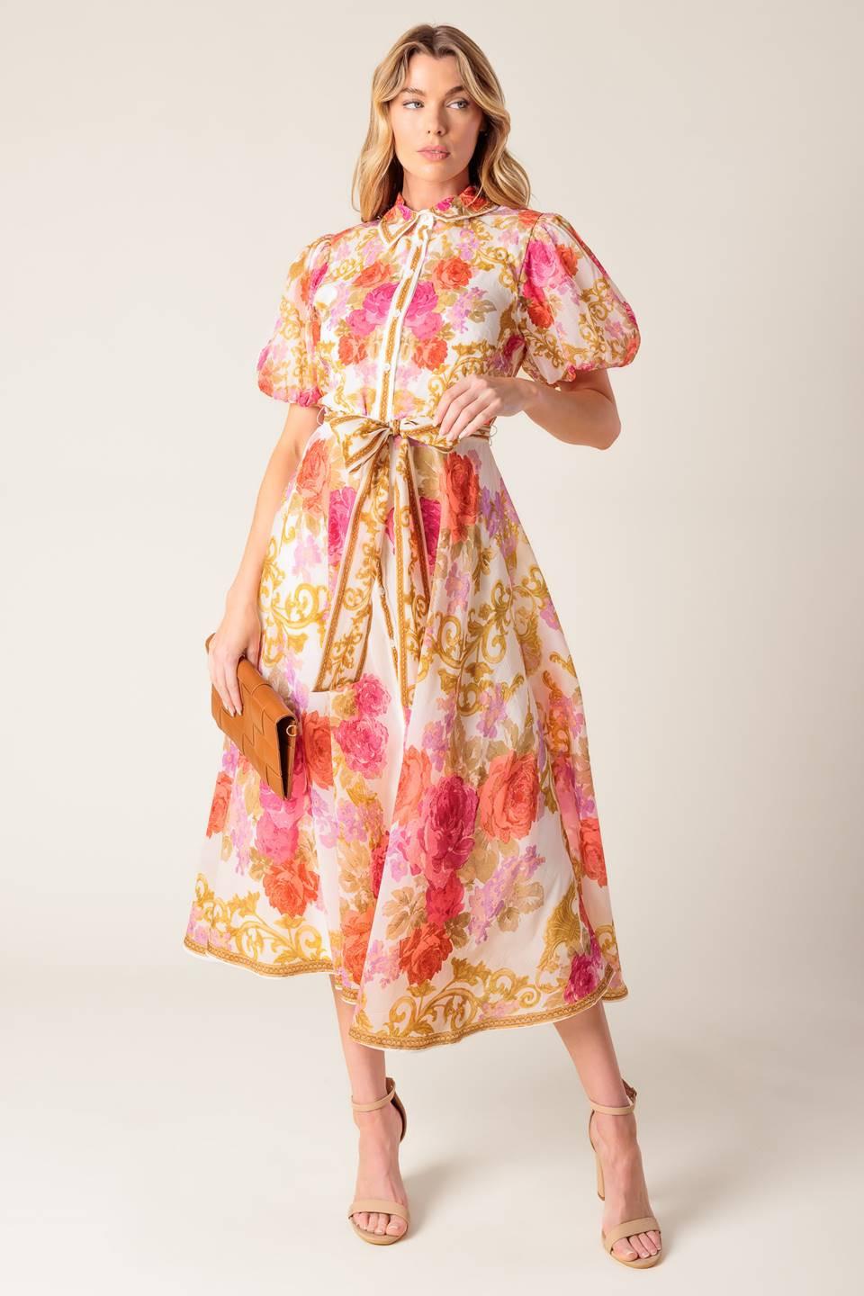 a woman in a floral dress