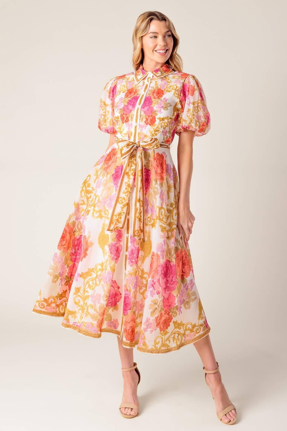 a woman in a floral dress