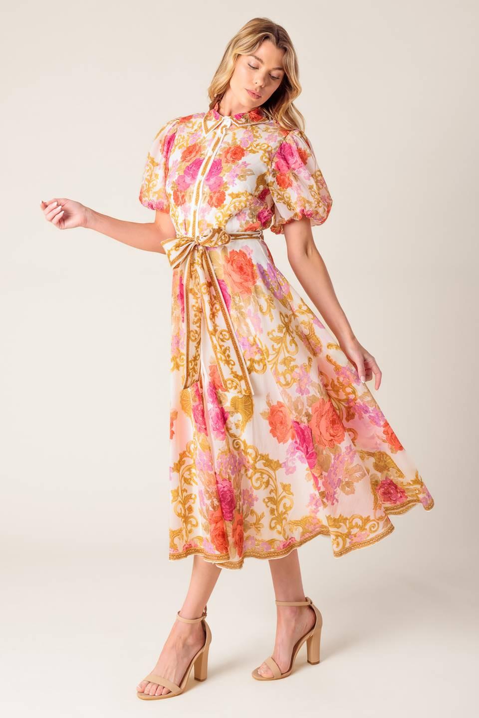 a woman in a floral dress