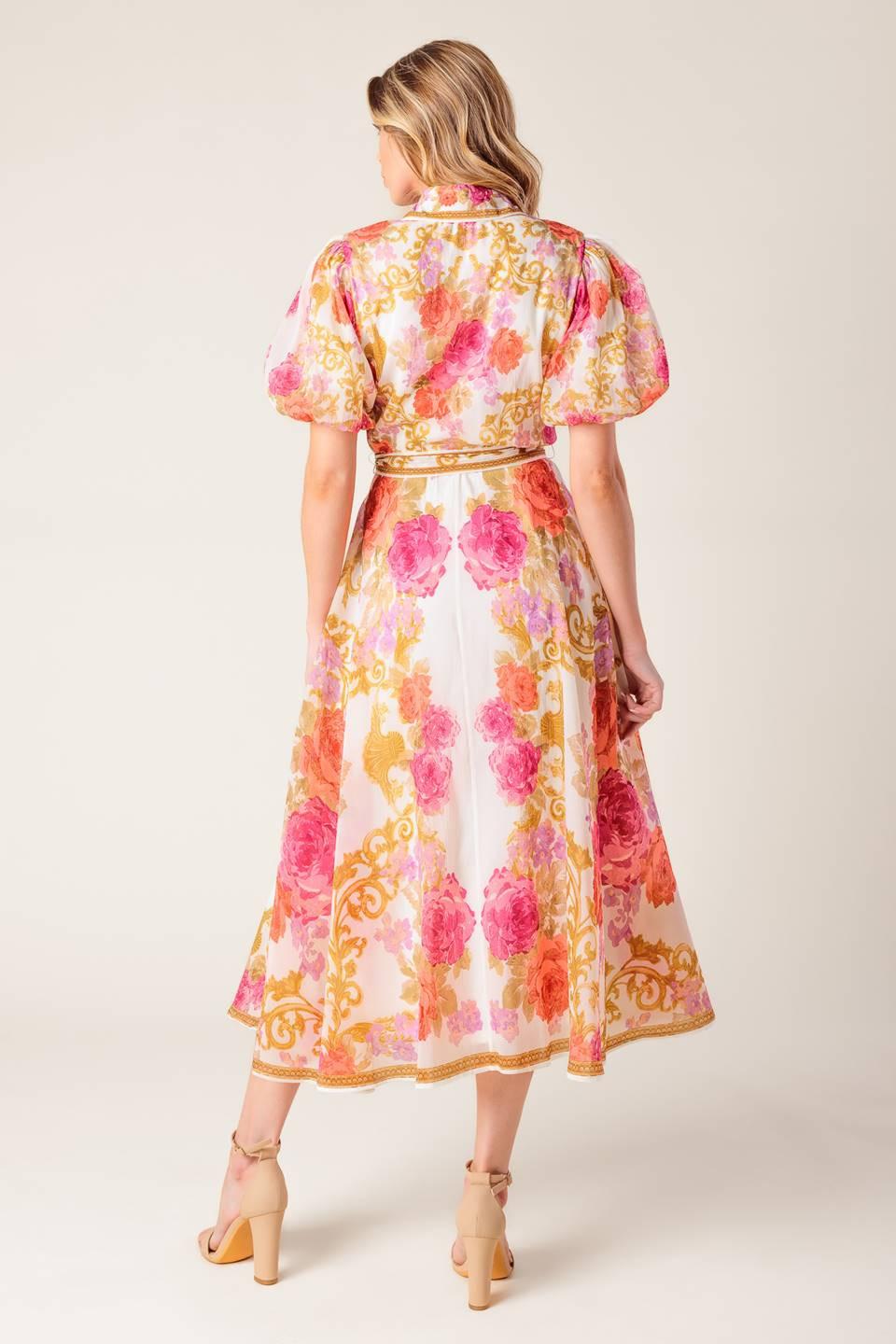 a woman in a floral dress