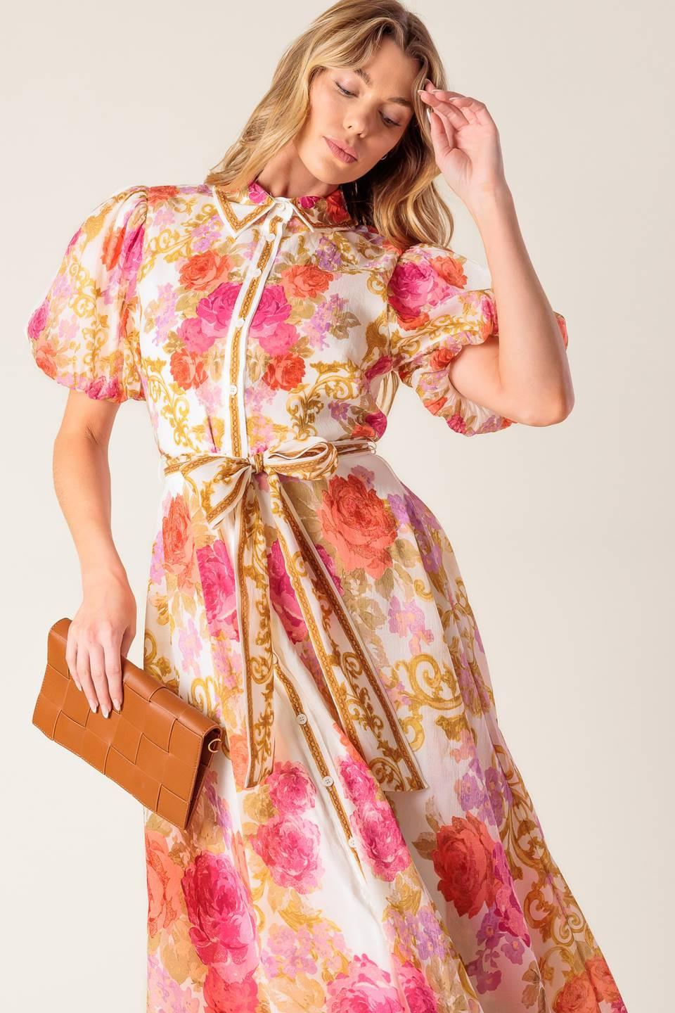 a woman in a floral dress