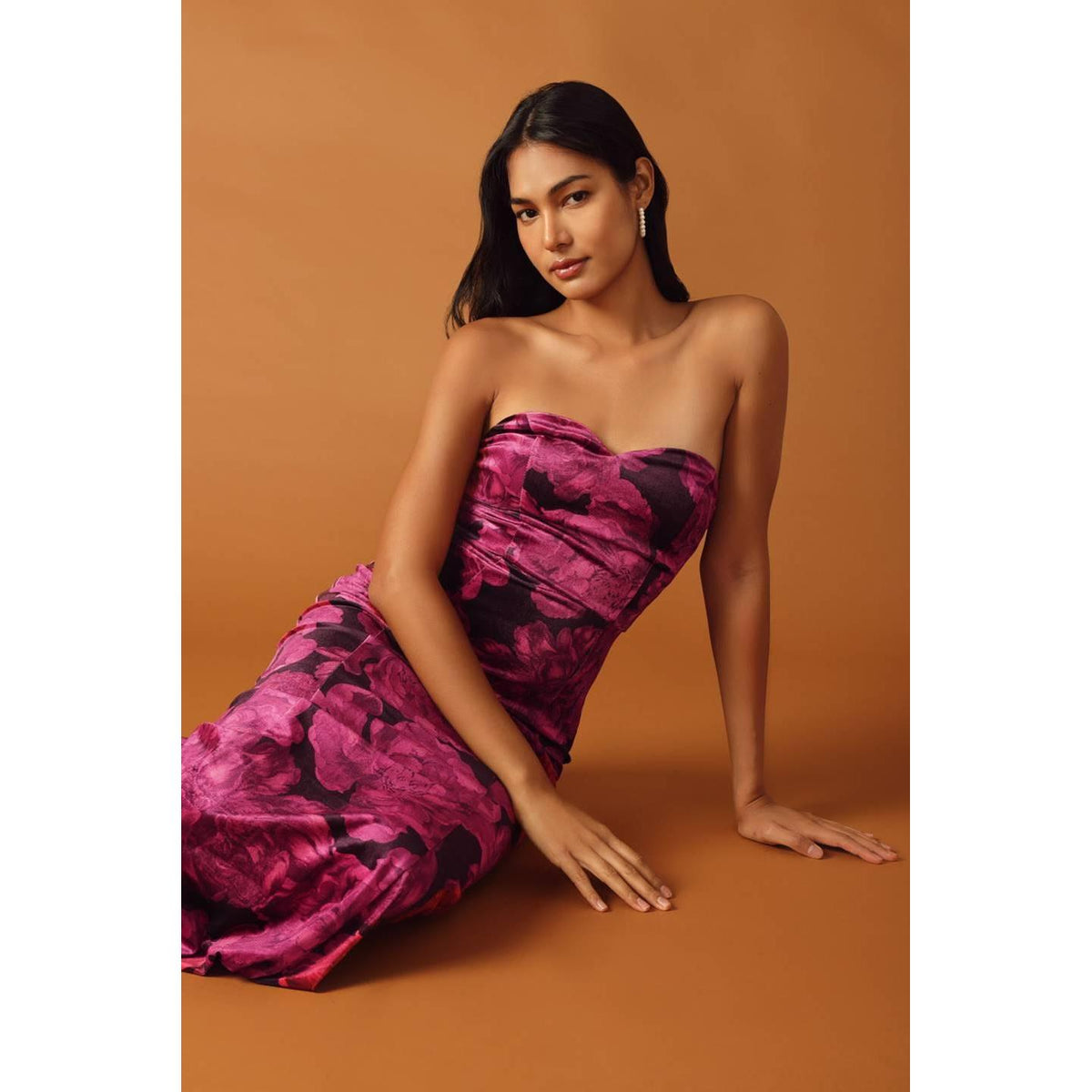 a woman in a pink dress