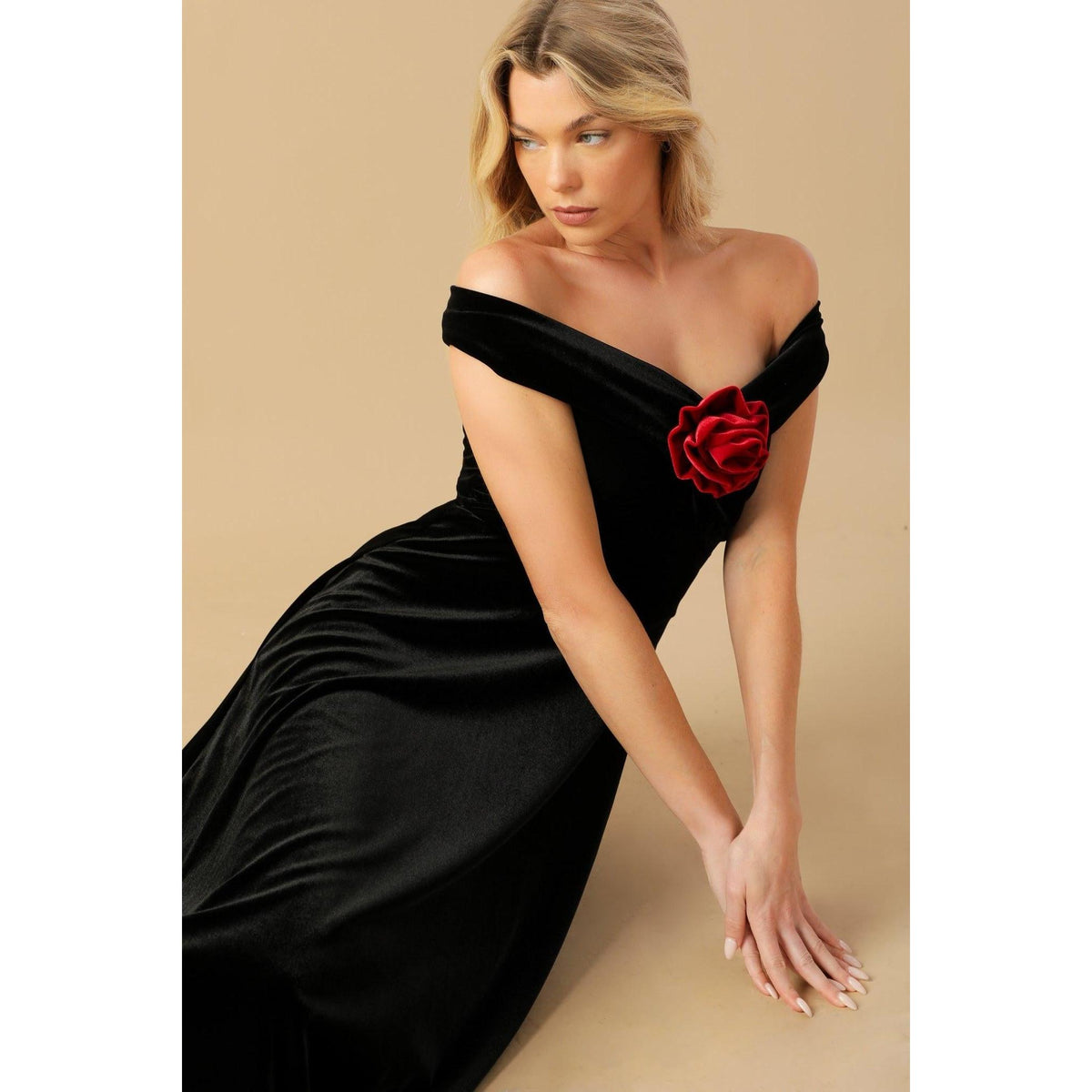 a woman in a black dress