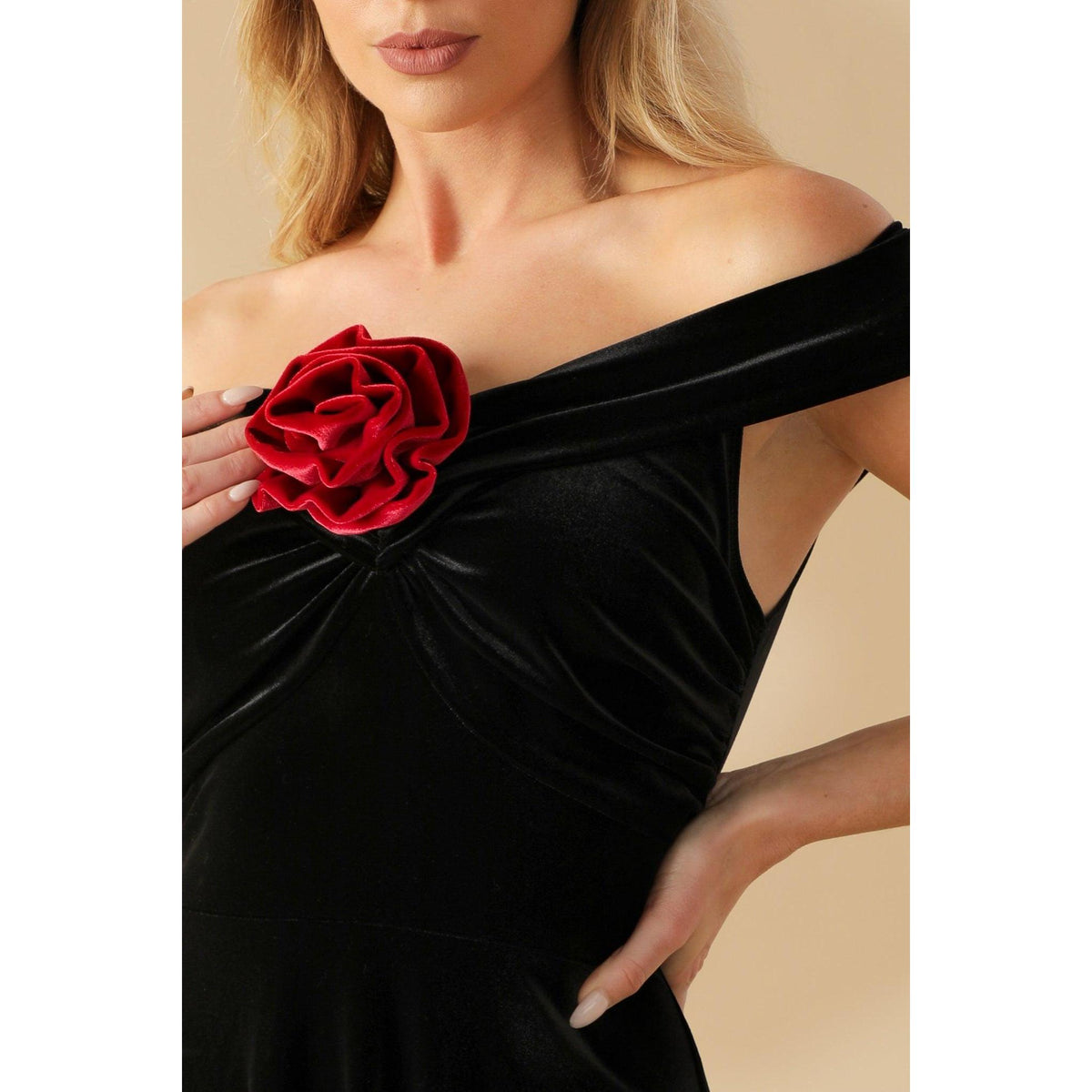 a woman wearing a black dress