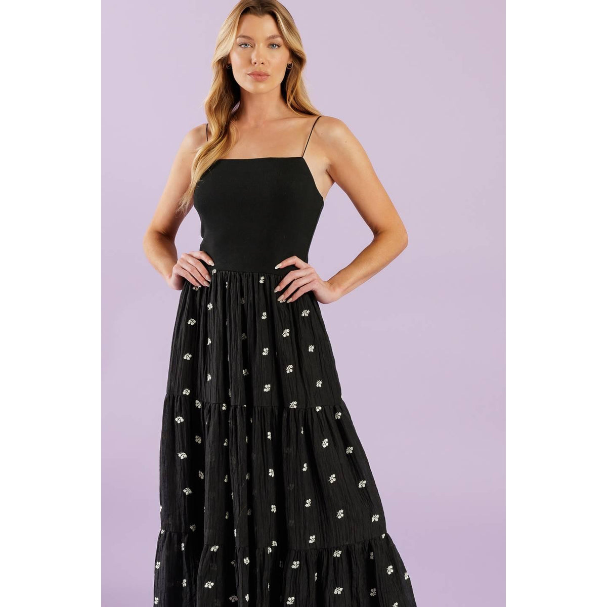a woman in a black dress