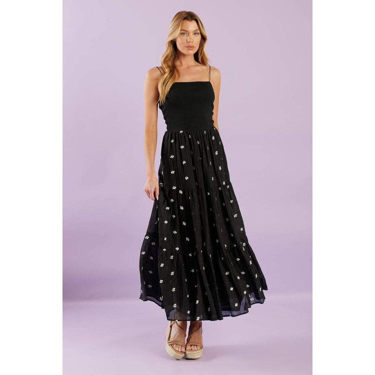 a woman in a black dress