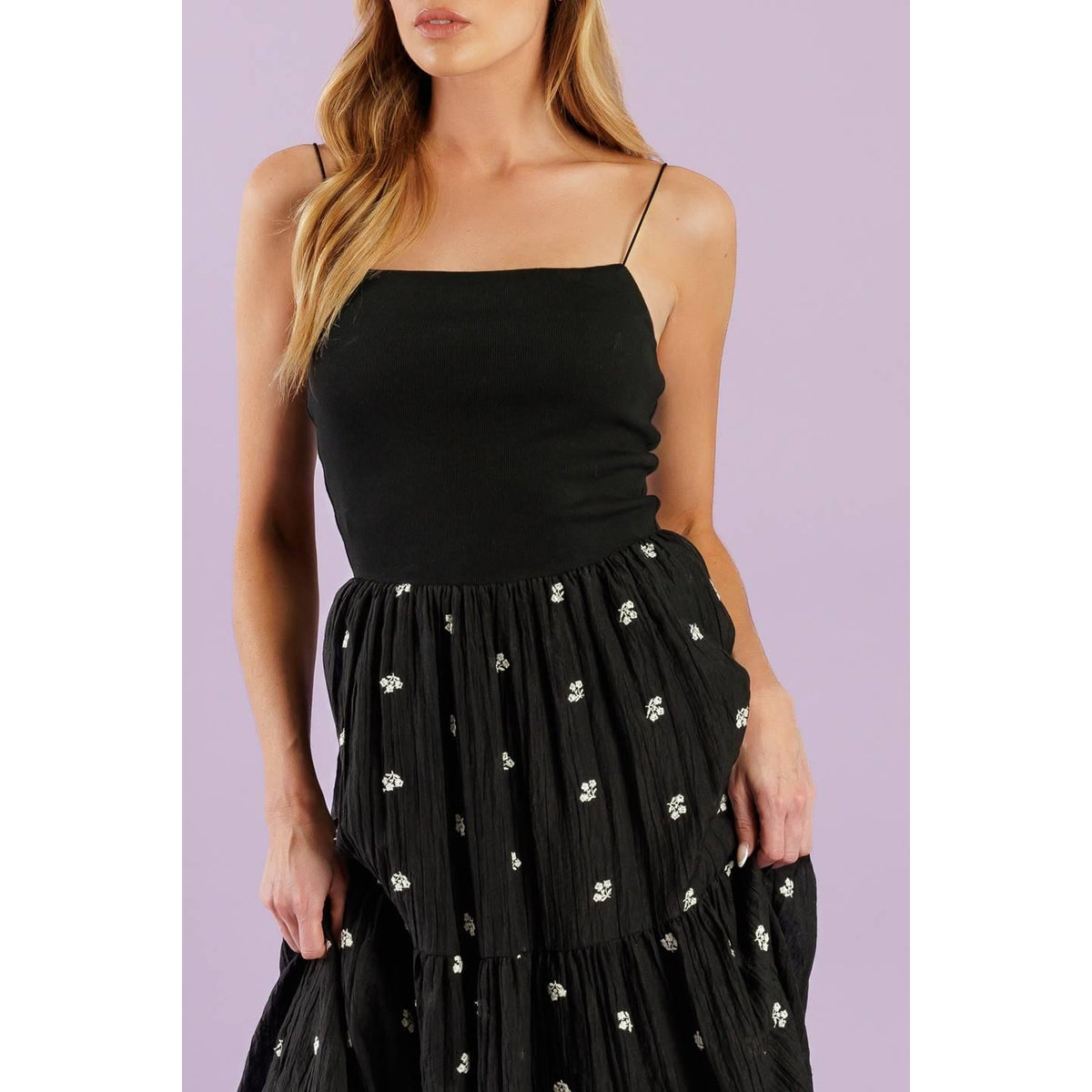 a woman in a black dress