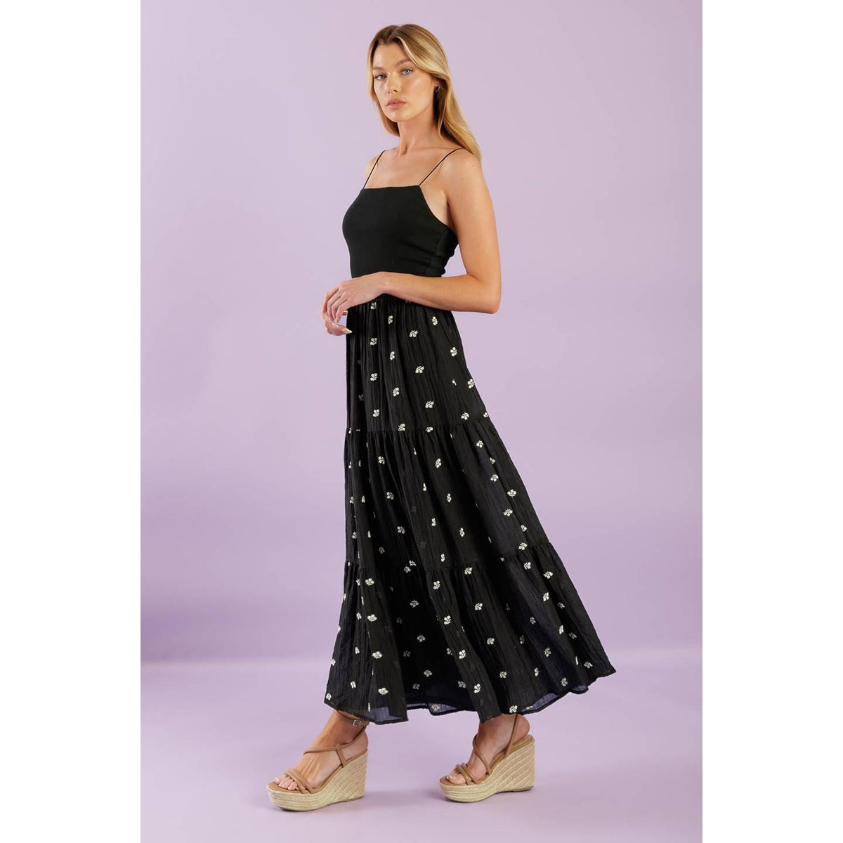 a woman in a black dress