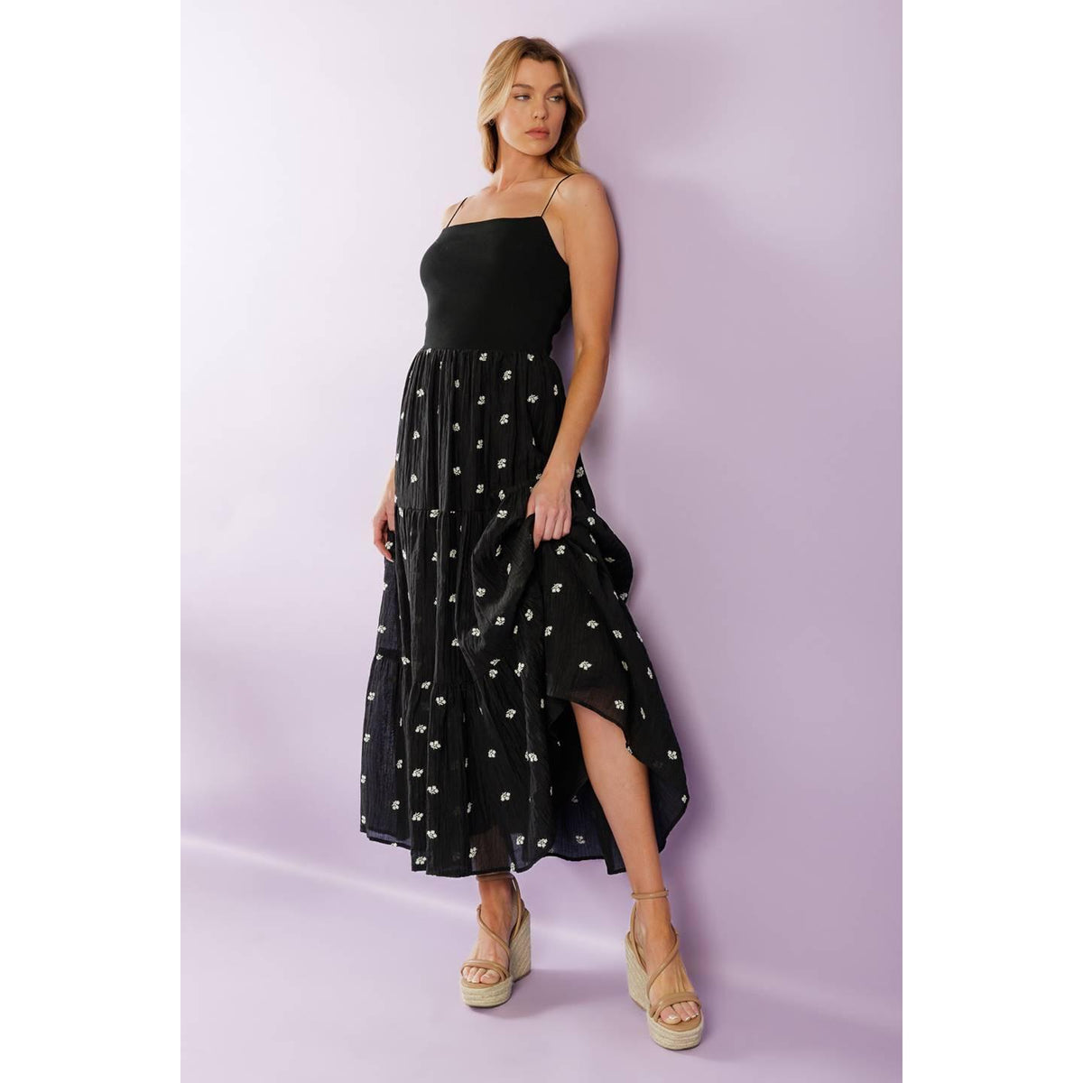 a woman in a black dress