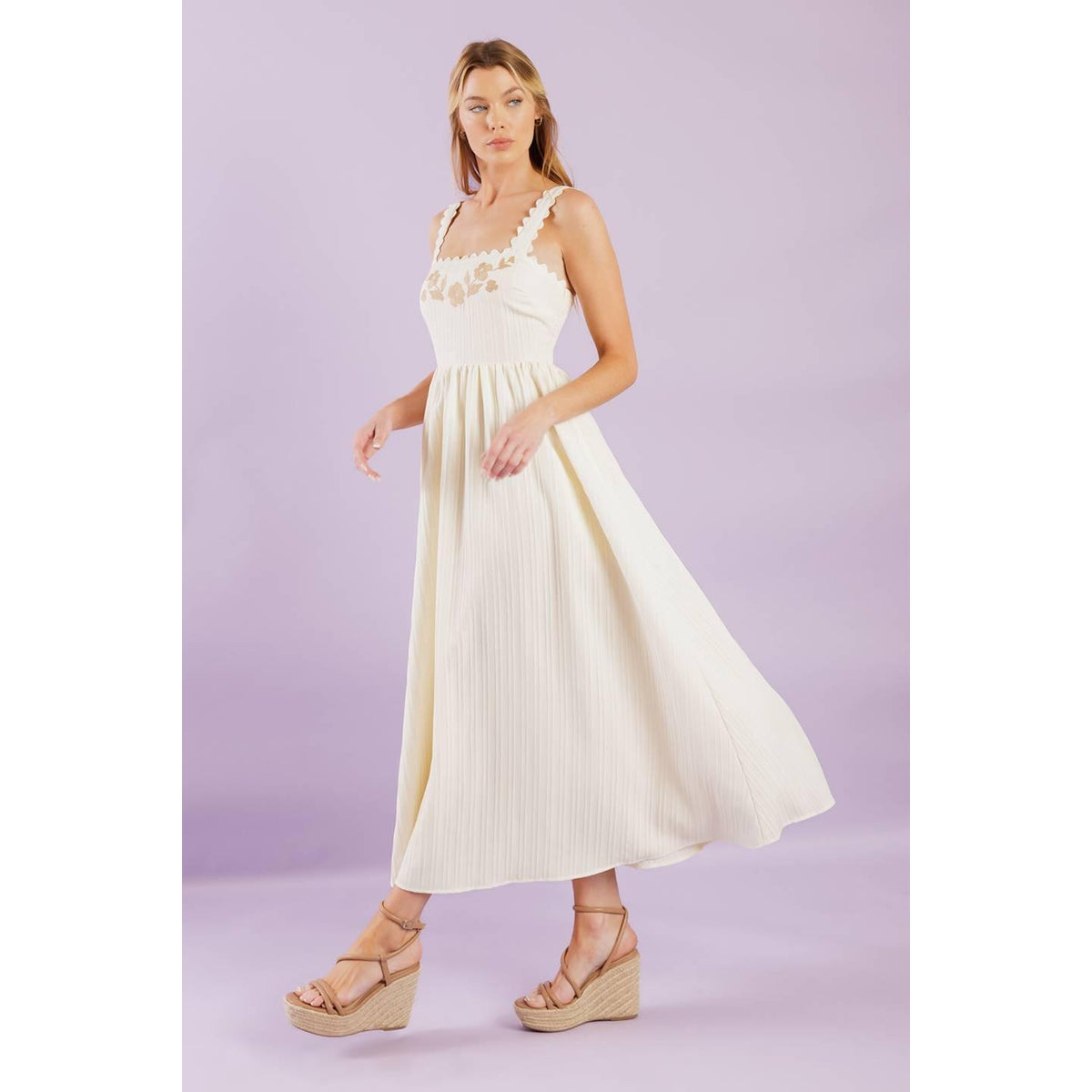 a woman in a white dress