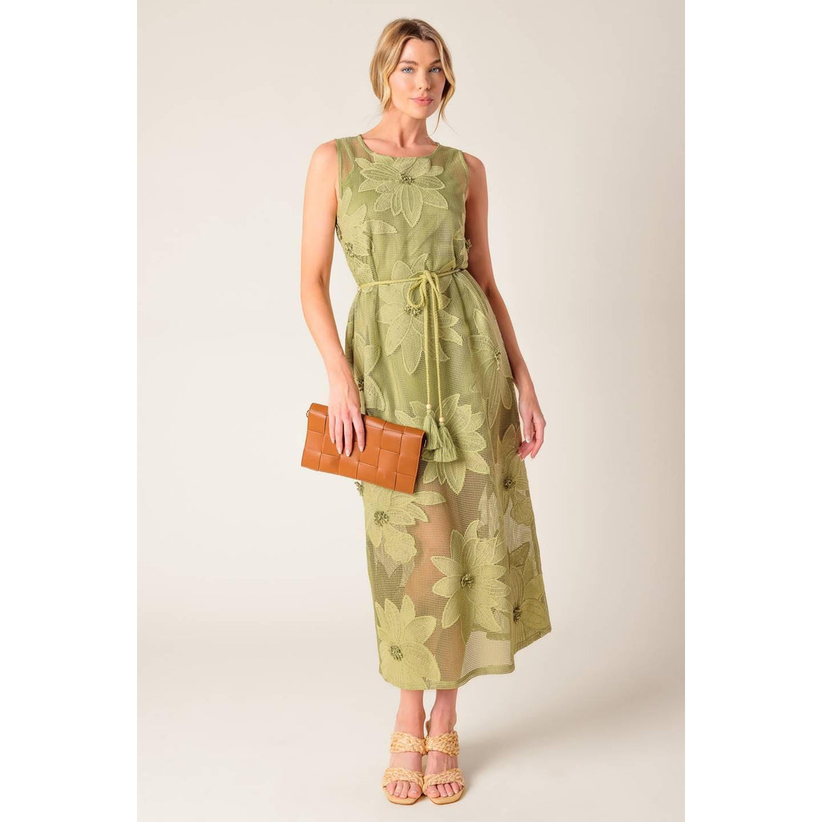 a woman in a green dress