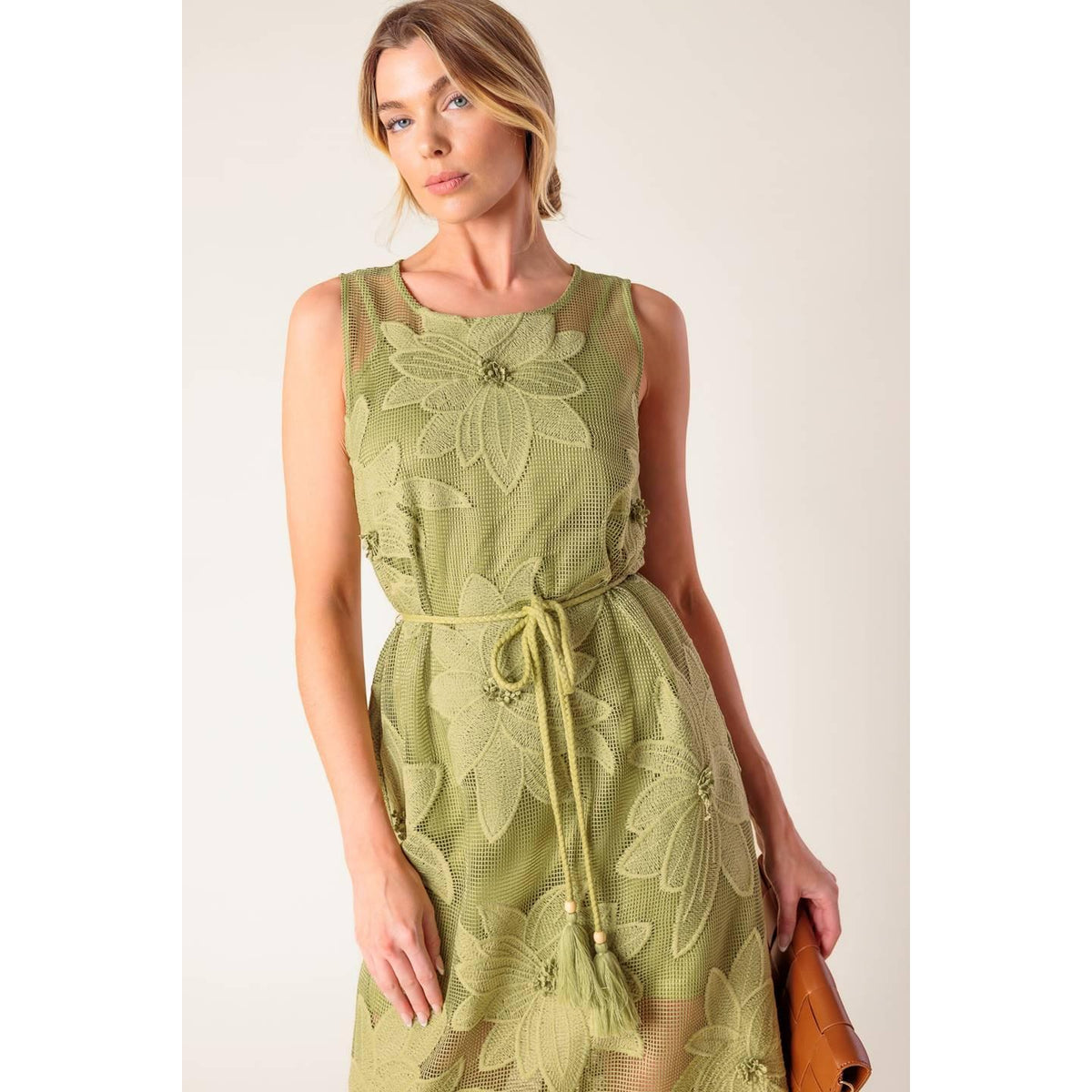a woman in a green dress