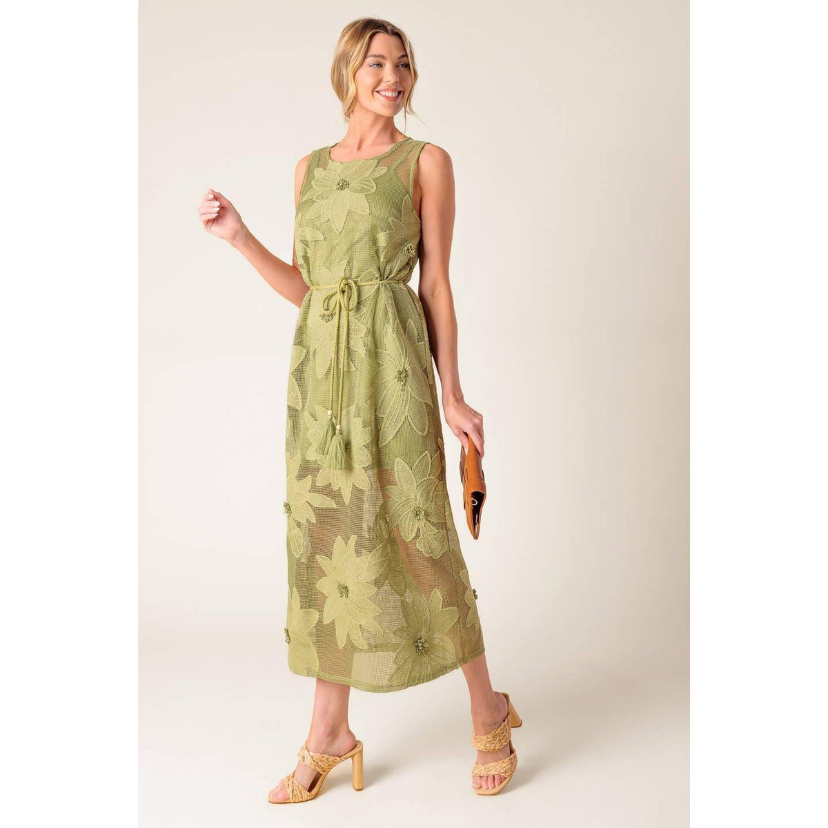 a woman in a green dress