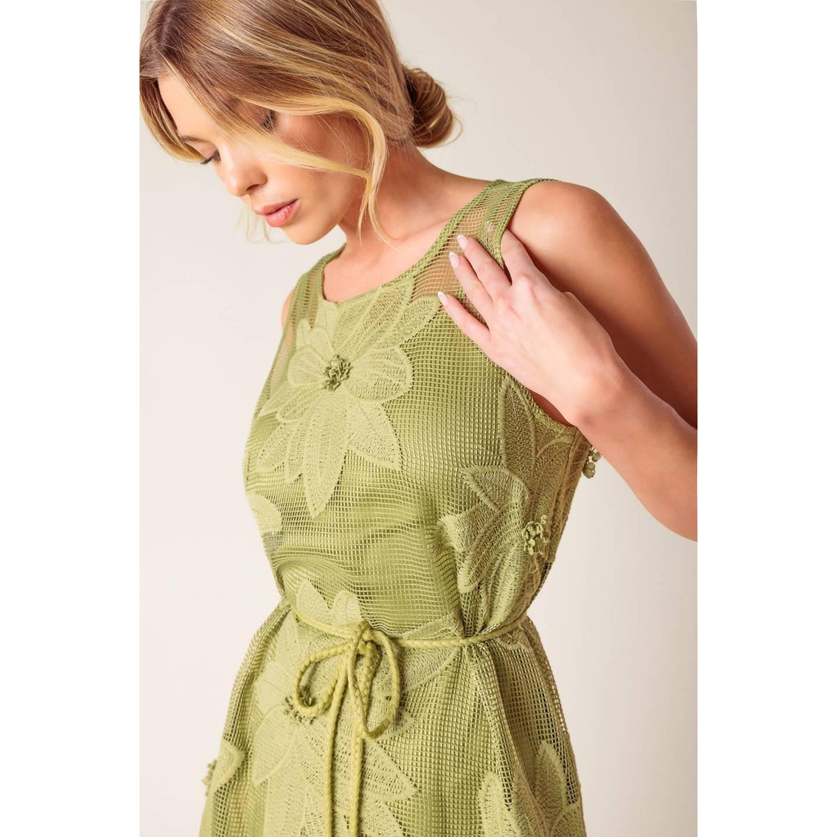 a woman in a green dress